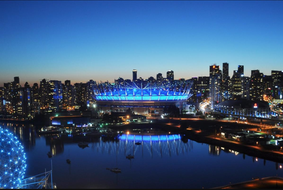 BC Place stadium lit up in blue