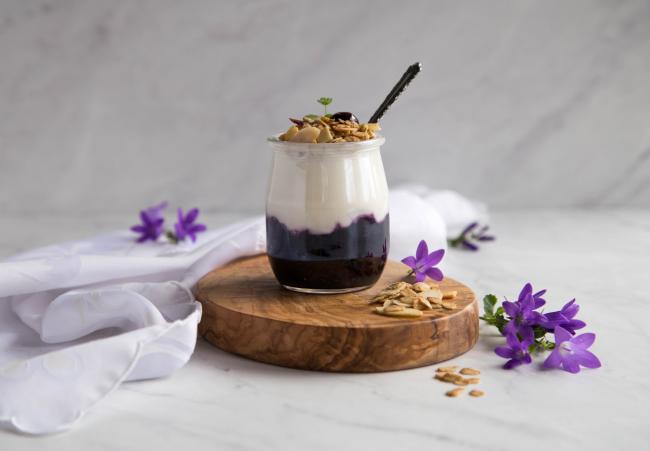 Granola yogurt parfait with blueberry compote