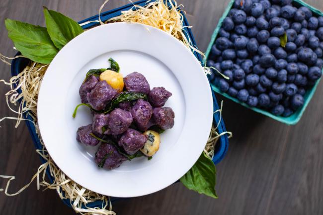 Bowl of Blueberry Ricotta Gnocchi in Brown Butter Basil Sauce